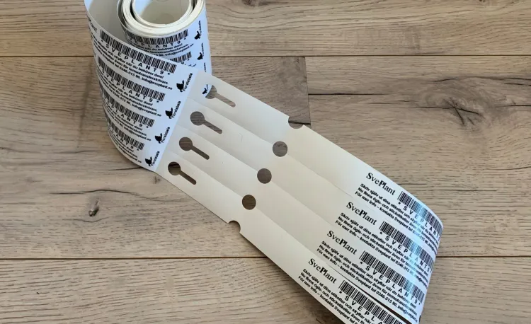Ögleetiketter på rulle