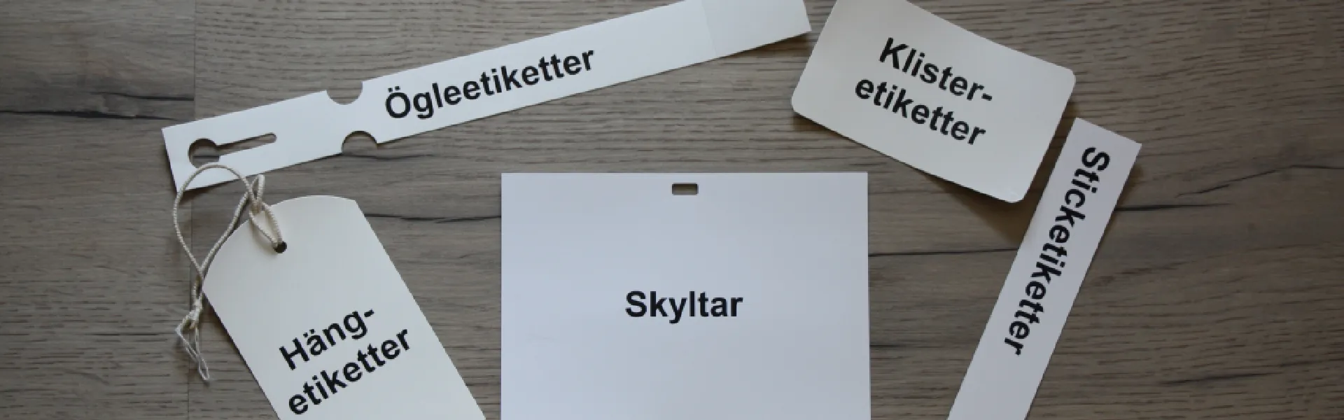 Ögleetiketter, klisteretiketter, sticketiketter, hängetiketter och skyltar från Floralabels